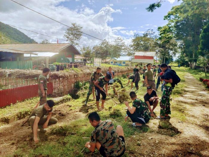 Satgas YR 142/KJ Bersihkan Jalan dan Fasilitas Umum di Bolakme